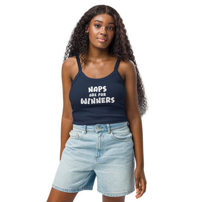 "Naps Are For Winners" printed on a solid navy blend women's micro-rib tanktop worn by a female
