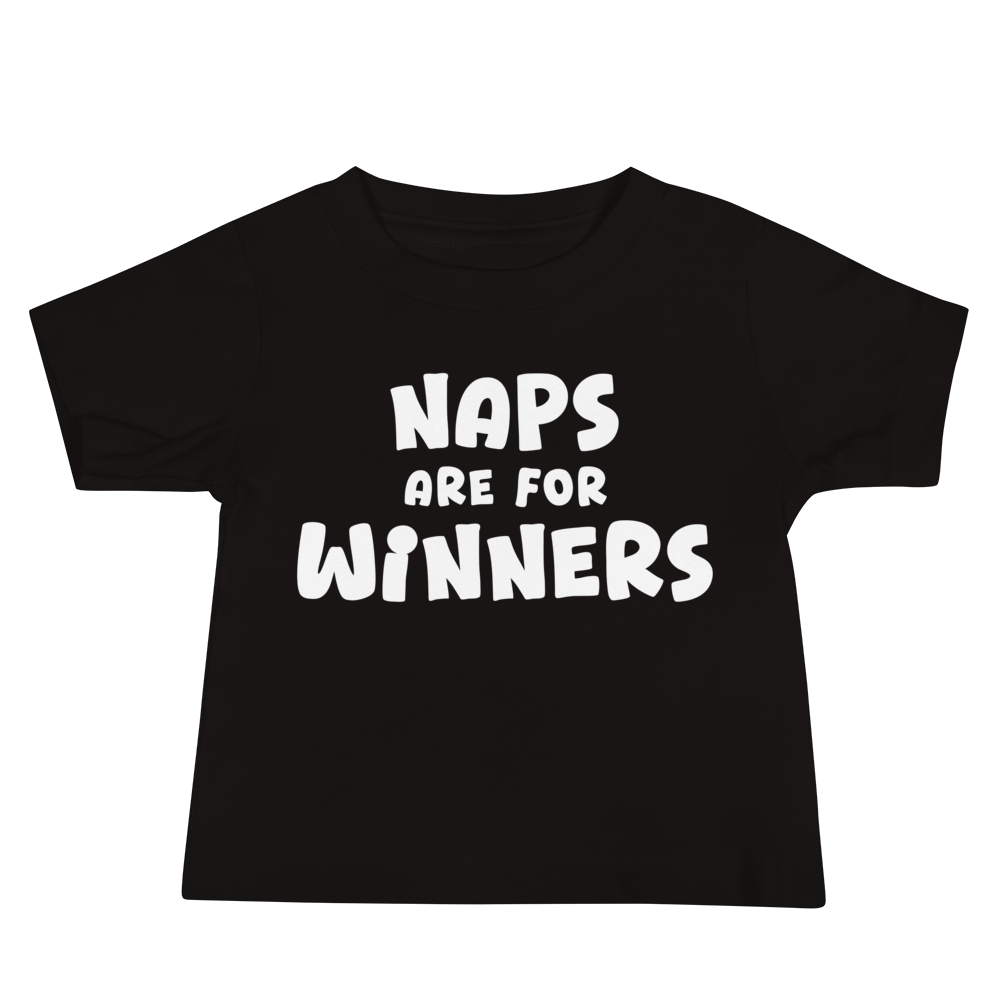 "Naps Are For Winners" printed on a black baby jersey short sleeve tee laying on a flat surface