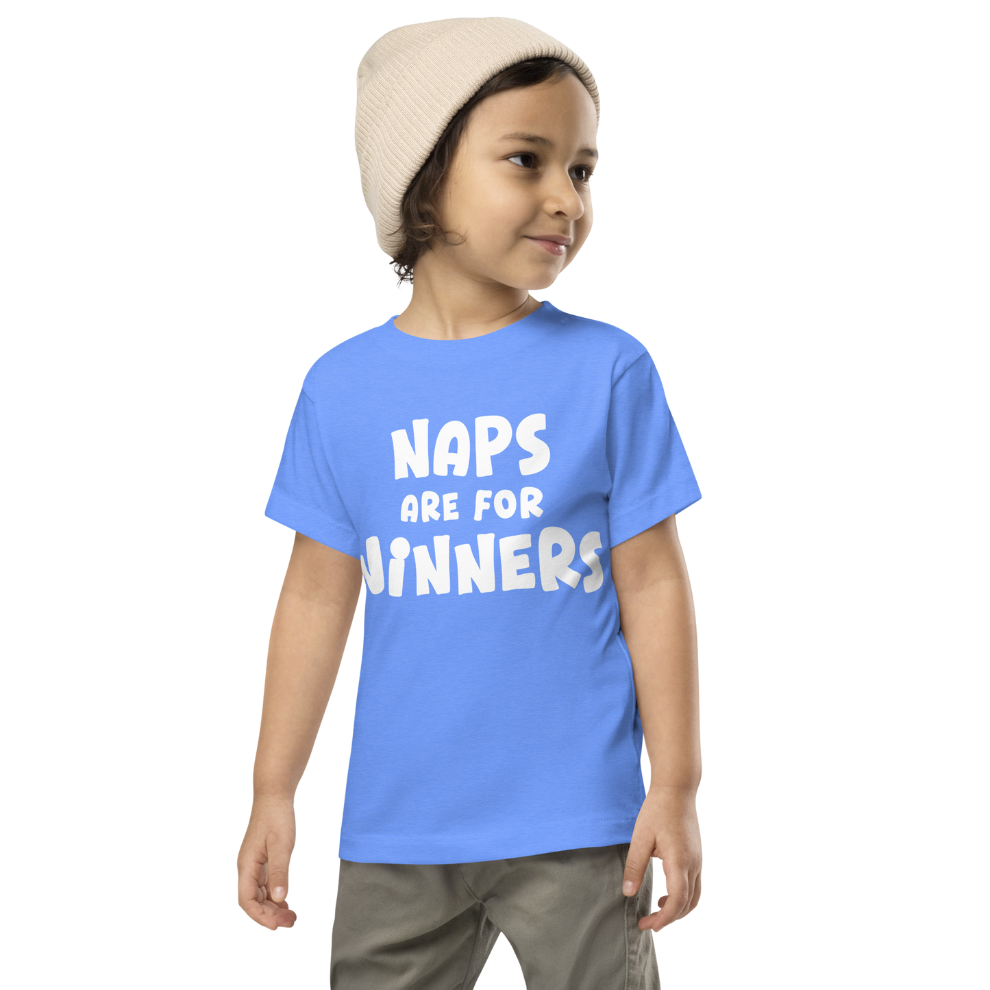 "Naps Are For Winners" printed on a heather columbia blue toddler short sleeve tee worn by a male wearing a cap