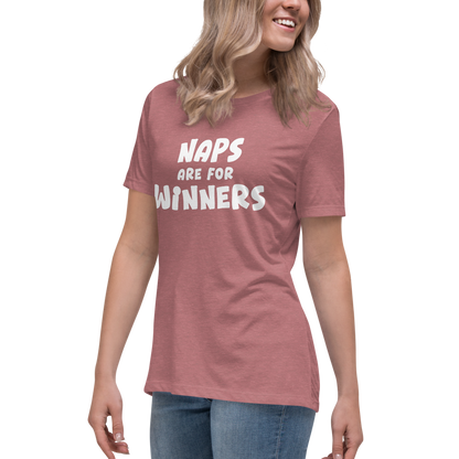 "Naps Are For Winners" printed on a heather mauve women's relaxed t-shirt worn by a female