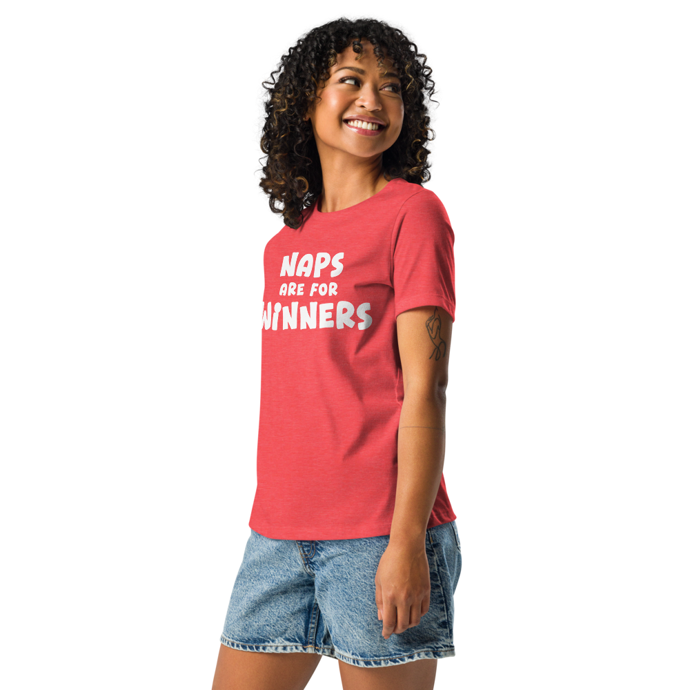 "Naps Are For Winners" printed on a heather red women's relaxed t-shirt worn by a female