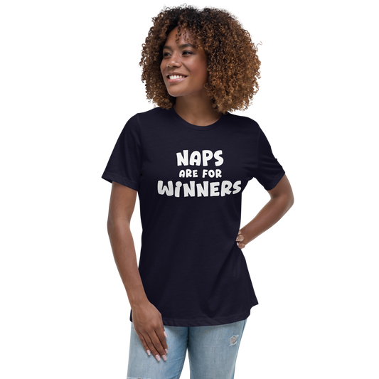 "Naps Are For Winners" printed on a navy women's relaxed t-shirt worn by a female