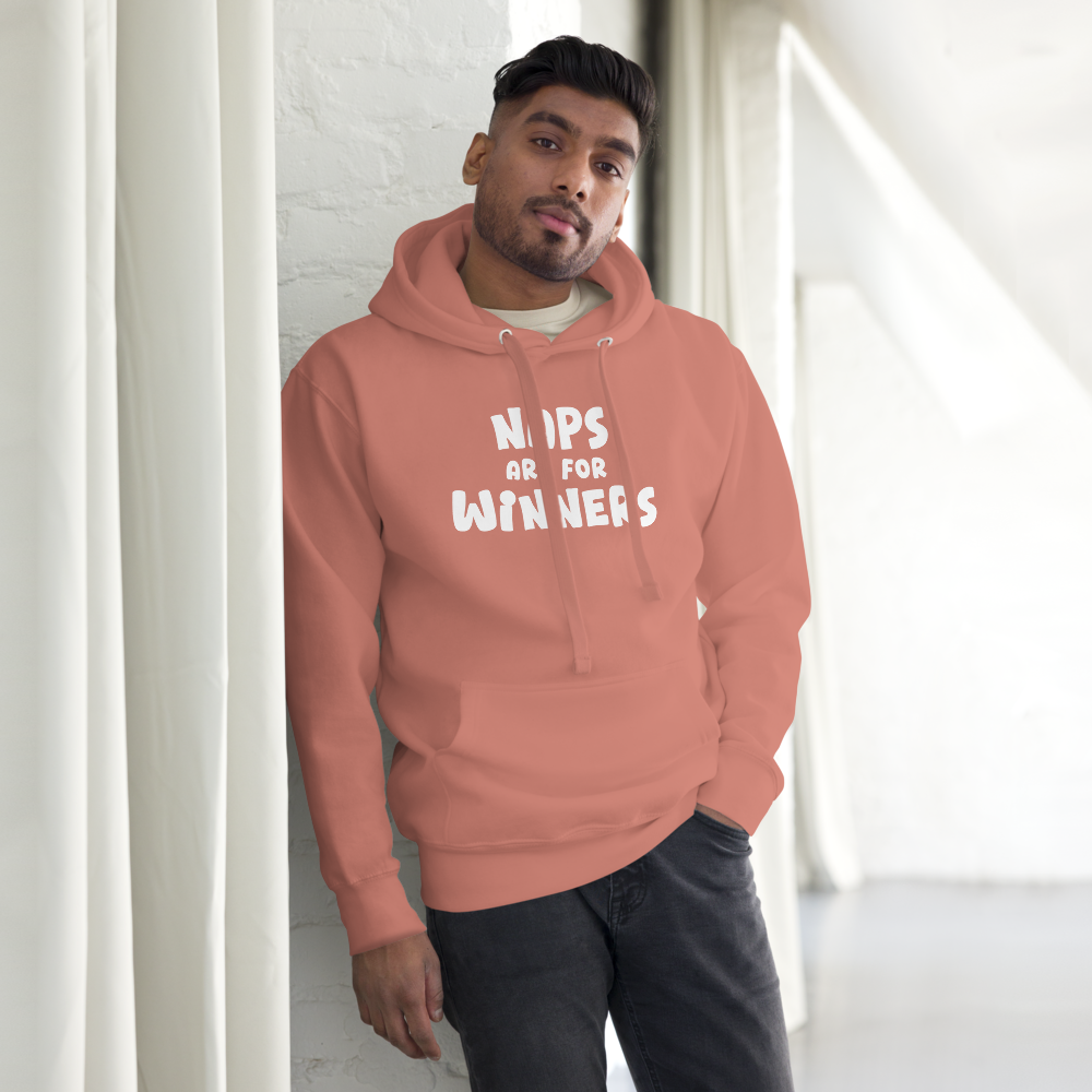"Naps Are For Winners" printed on a dusty rose unisex hoodie worn by a male