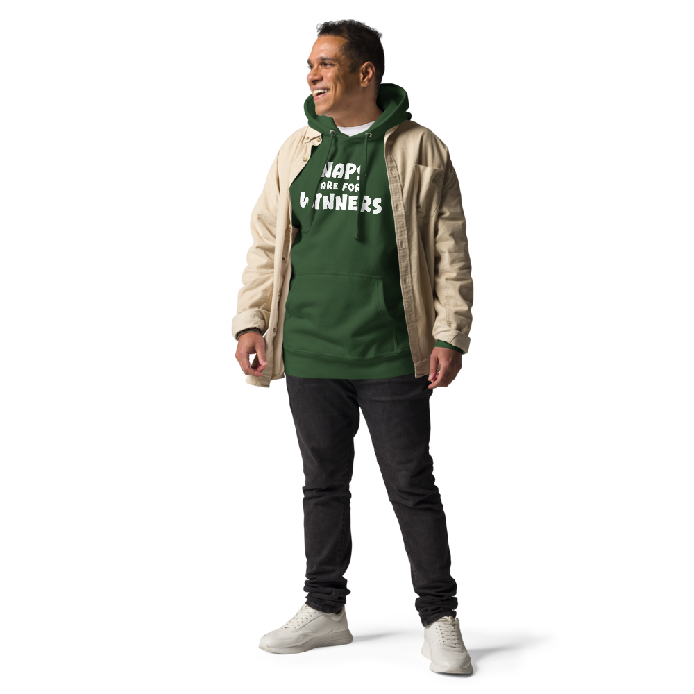 "Naps Are For Winners" printed on a forest green unisex hoodie worn by a male with a jacket on top