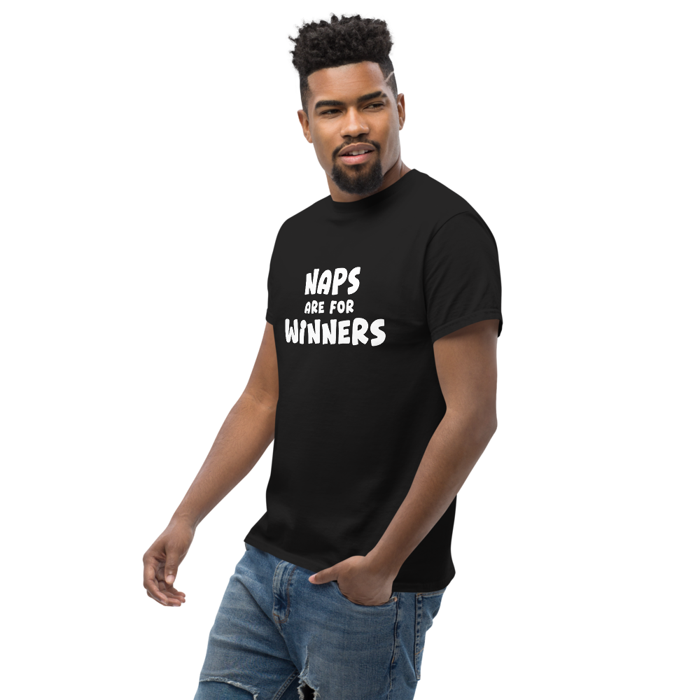 "Naps Are For Winners" printed on a black unisex classic tee worn by a male