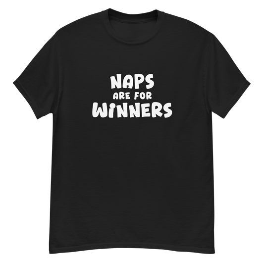 "Naps Are For Winners" printed on a black unisex classic tee laying on a flat surface