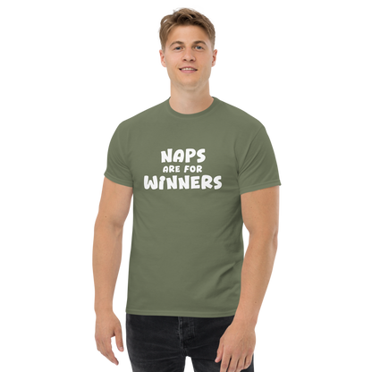 "Naps Are For Winners" printed on a military green unisex classic tee worn by a male