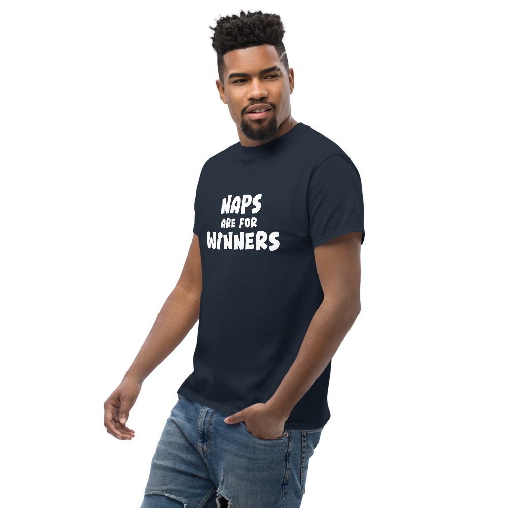 "Naps Are For Winners" printed on a navy unisex classic tee worn by a male