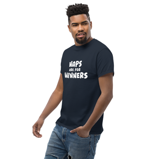 "Naps Are For Winners" printed on a navy unisex classic tee worn by a male