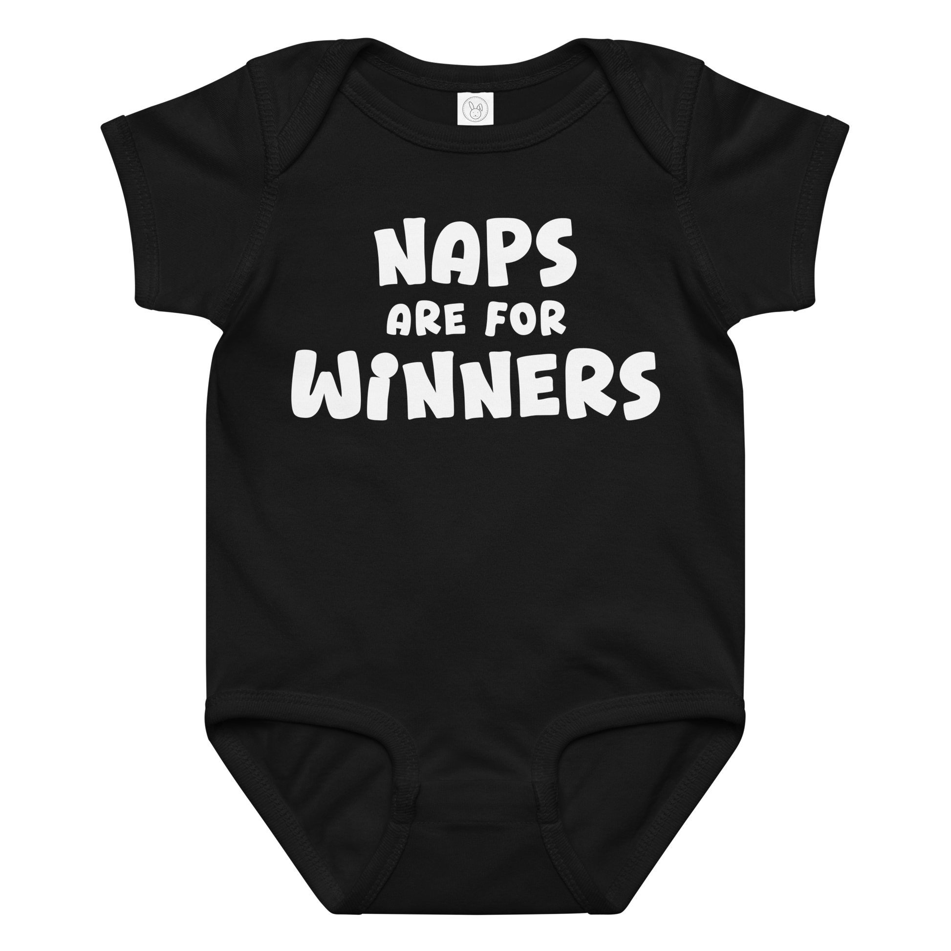 "Naps Are For Winners" printed on a black baby jersey bodysuit laying on a flat surface amongst other clothes