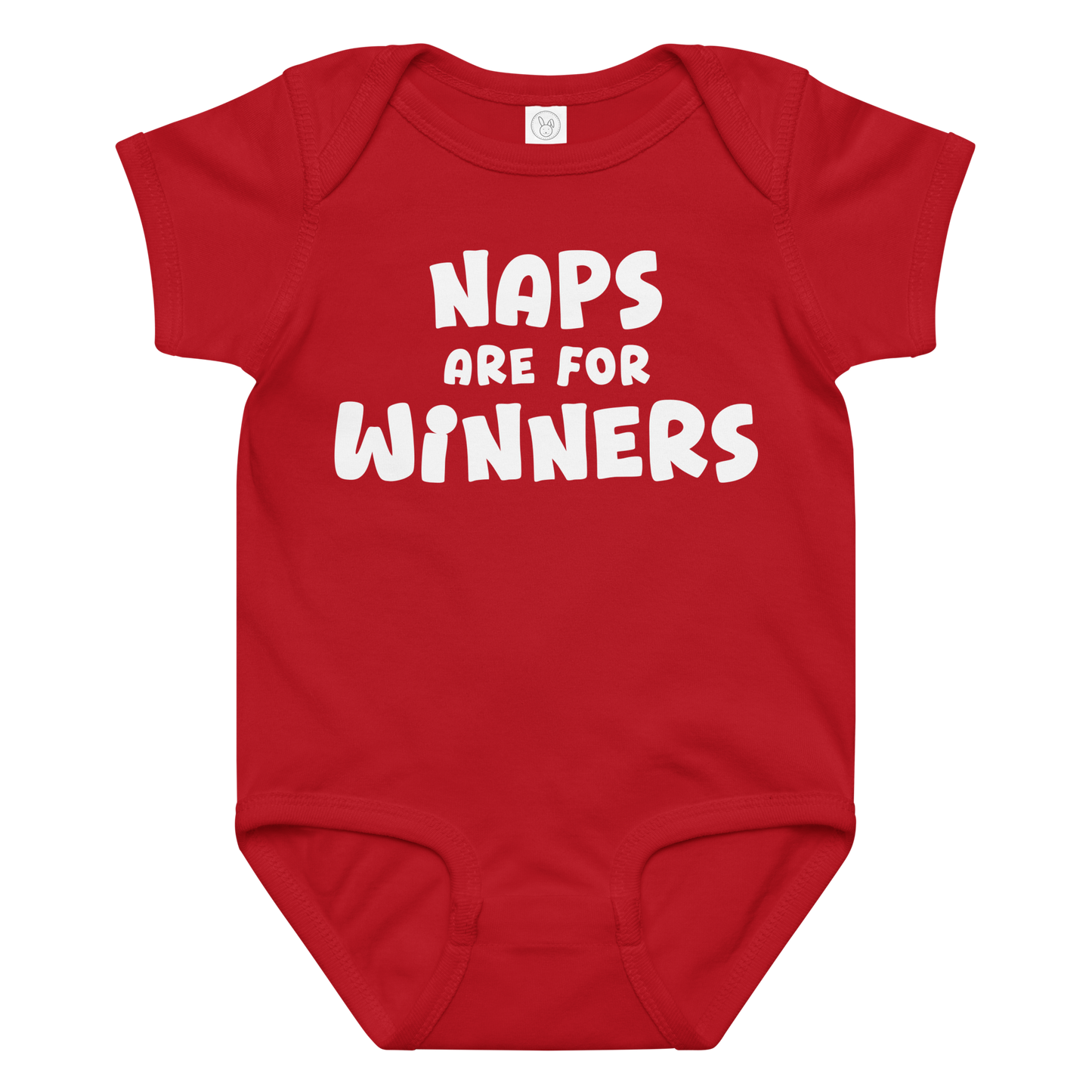 "Naps Are For Winners" printed on a red baby jersey bodysuit laying on a flat surface amongst other clothes