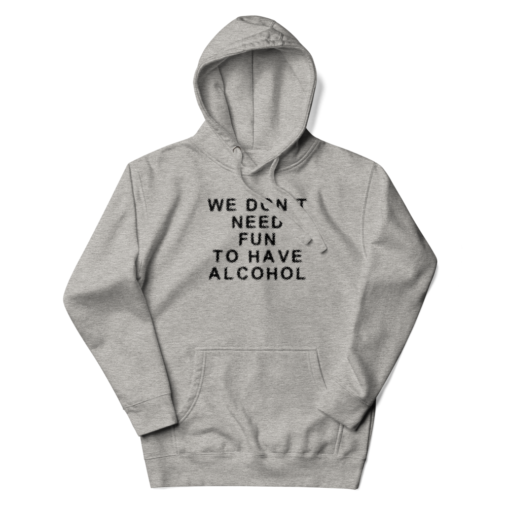 "We don’t need fun to have alcohol" printed on a carbon grey unisex hoodie laying on a flat surface with the hood up