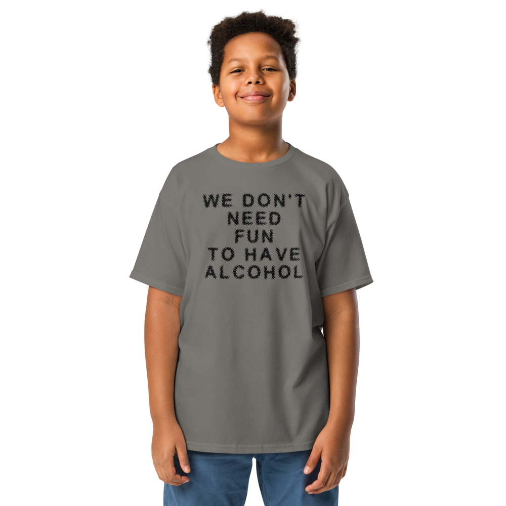 "We don’t need fun to have alcohol" printed on a charcoal youth classic tee worn by a male