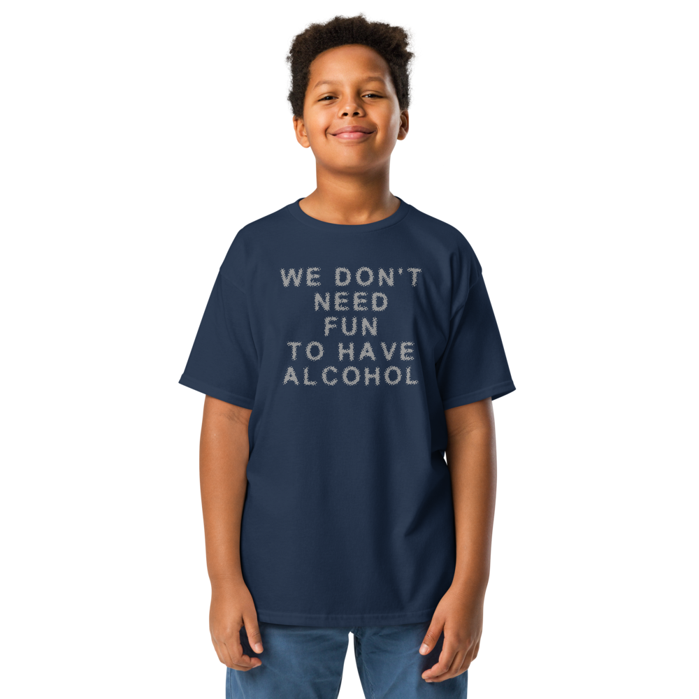 "We don’t need fun to have alcohol" printed on a navy youth classic tee worn by a male