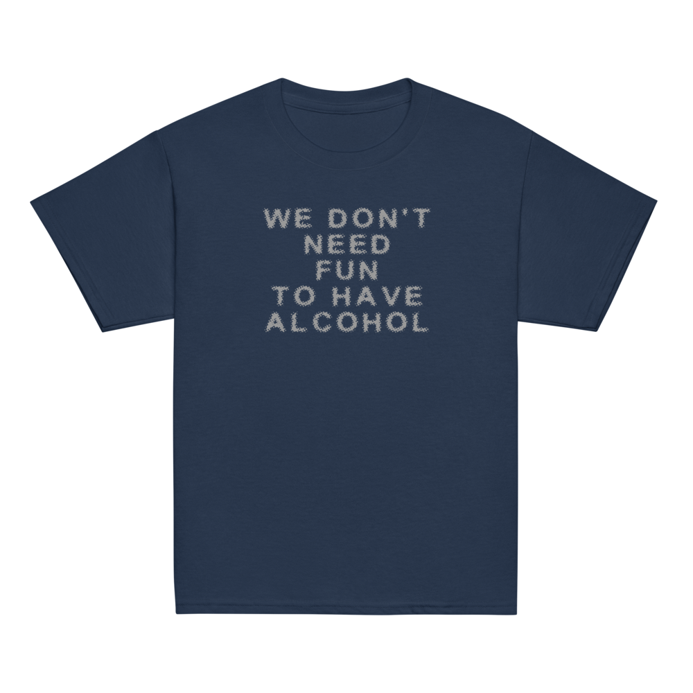 "We don’t need fun to have alcohol" printed on a navy youth classic tee laying on a flat surface