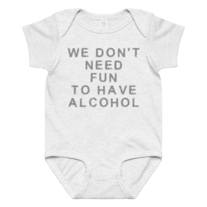 "We don’t need fun to have alcohol" printed on a ash baby jersey bodysuit laying on a flat surface amongst other clothes