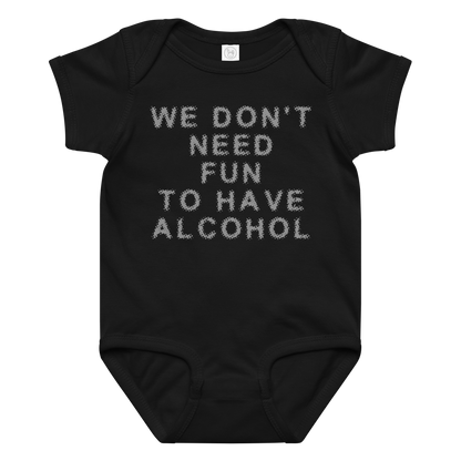 "We don’t need fun to have alcohol" printed on a black baby jersey bodysuit laying on a flat surface amongst other clothes
