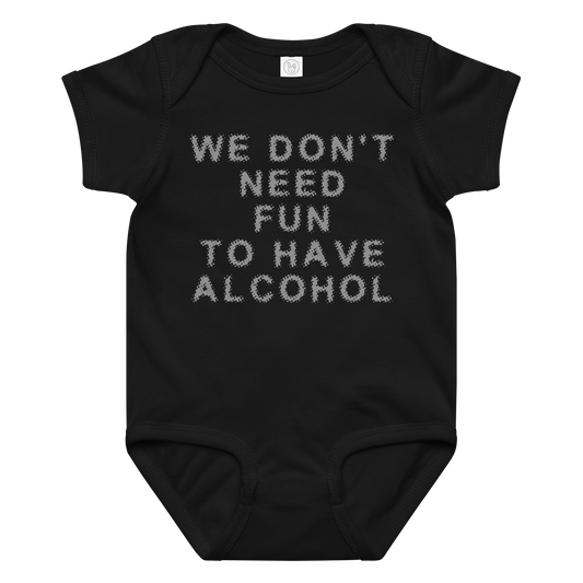 "We don’t need fun to have alcohol" printed on a black baby jersey bodysuit laying on a flat surface amongst other clothes