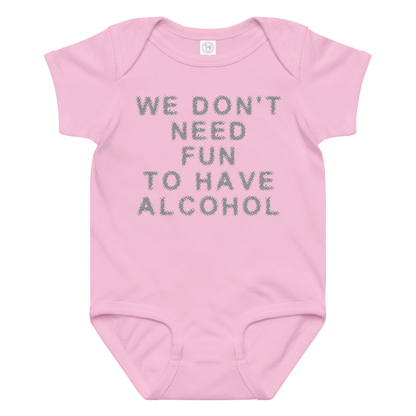"We don’t need fun to have alcohol" printed on a pink baby jersey bodysuit laying on a flat surface amongst other clothes