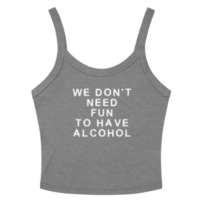 "We don’t need fun to have alcohol" printed on a athletic heather women's micro-rib tanktop laying on a flat surface amongst sunglasses and shorts