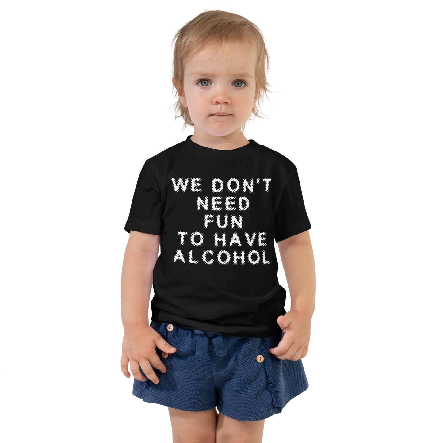 "We don’t need fun to have alcohol" printed on a black toddler short sleeve tee worn by a female