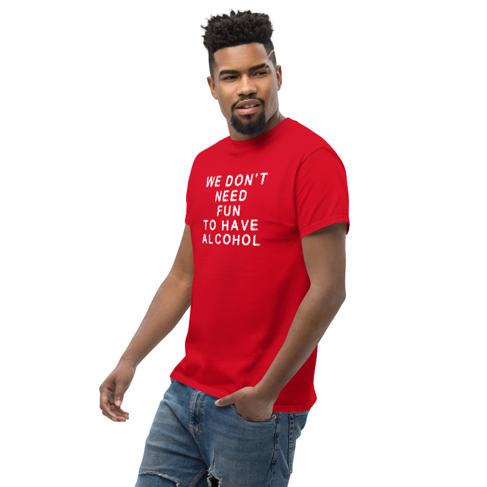"We don’t need fun to have alcohol" printed on a red unisex classic tee worn by a male