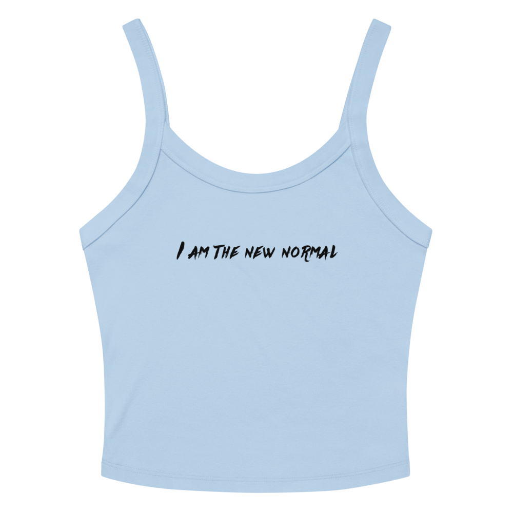 "I am the new normal" printed on a solid baby blue blend women's micro-rib tanktop laying on a flat surface amongst sunglasses and shorts