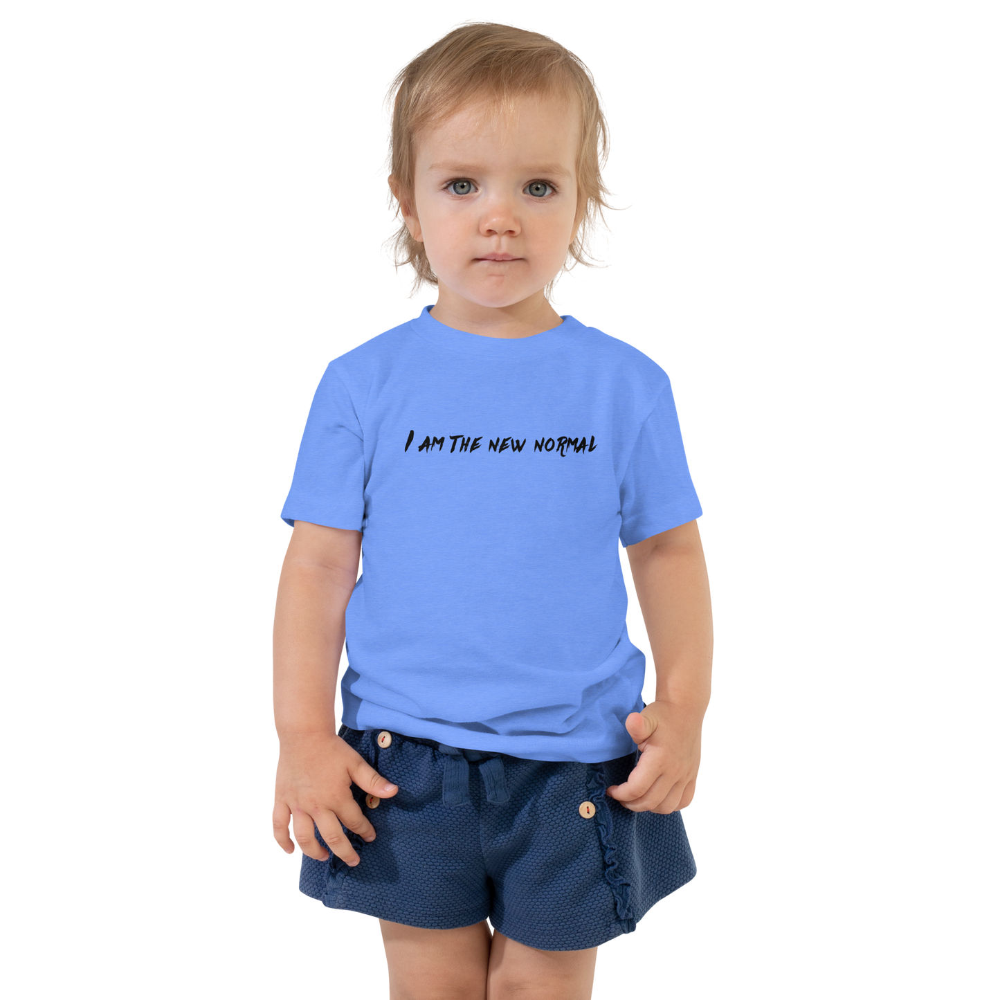 "I am the new normal" printed on a heather columbia blue toddler short sleeve tee worn by a female