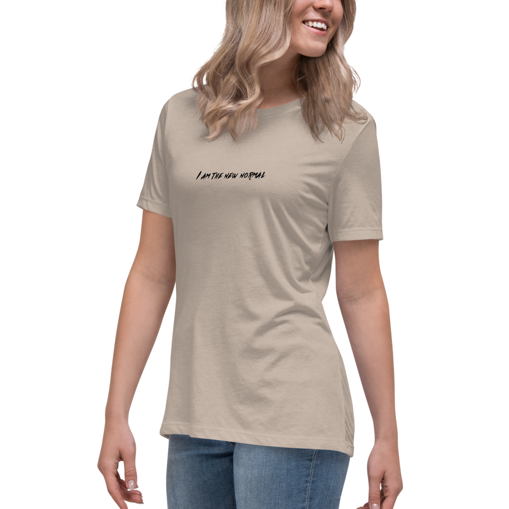 "I am the new normal" printed on a heather stone women's relaxed t-shirt worn by a female