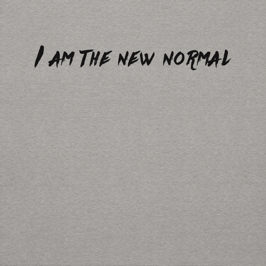 "I am the new normal" printed on a carbon grey background