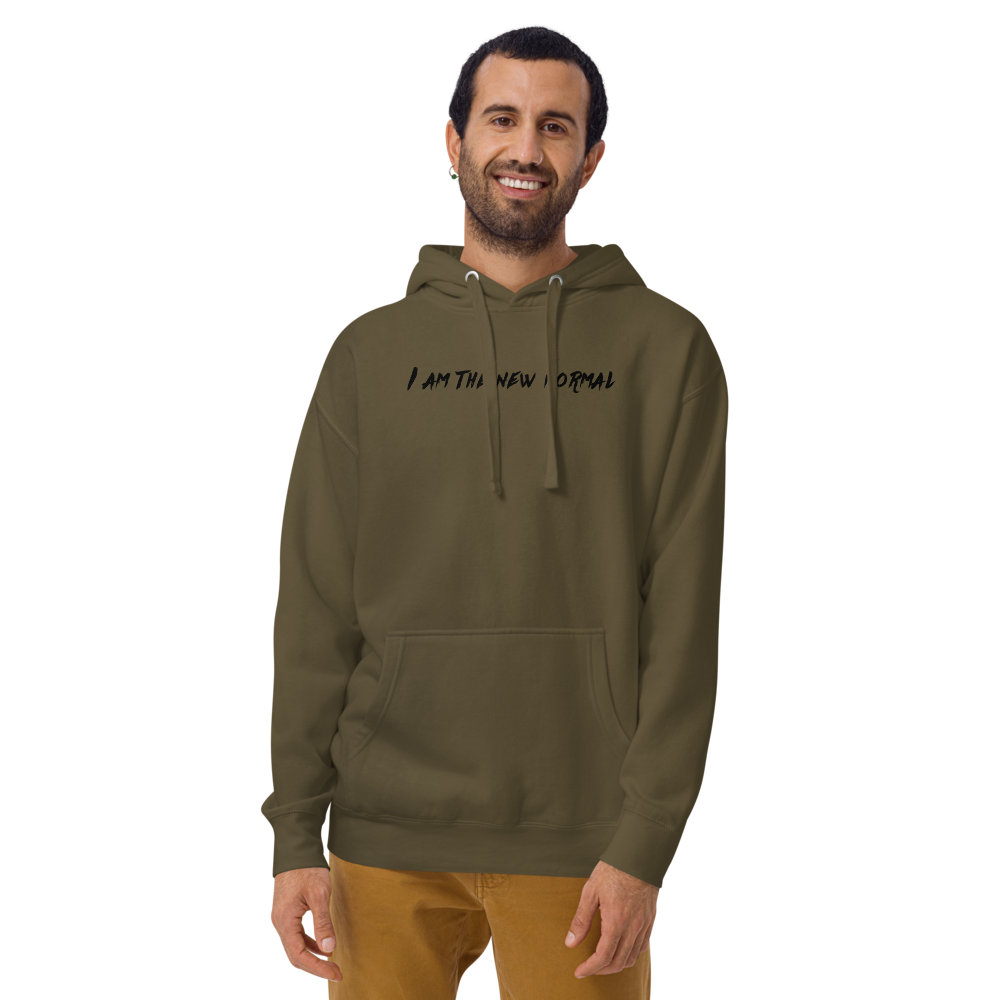 "I am the new normal" printed on a military green warn by a male