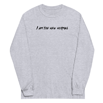 "I am the new normal" printed on a sport grey men's long sleeve shirt laying on a flat surface