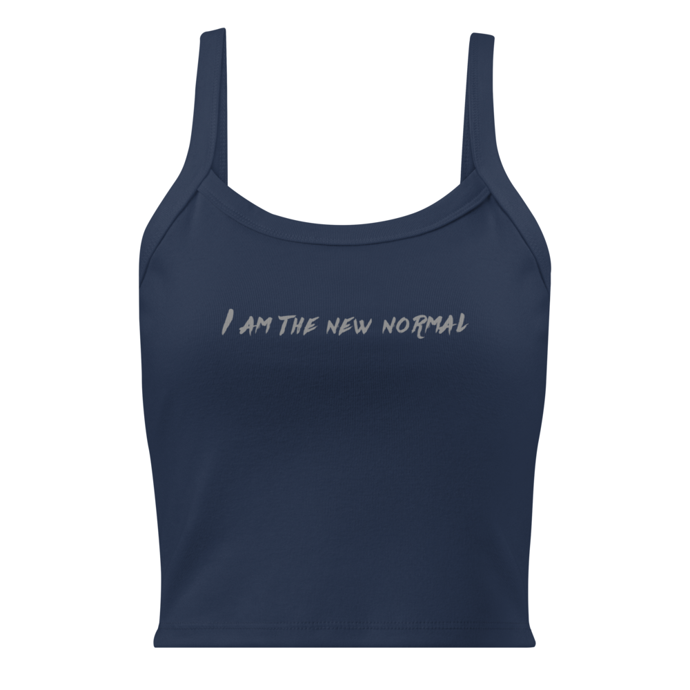 "I am the new normal" printed on a solid navy blend women's micro-rib tanktop laying on a flat surface