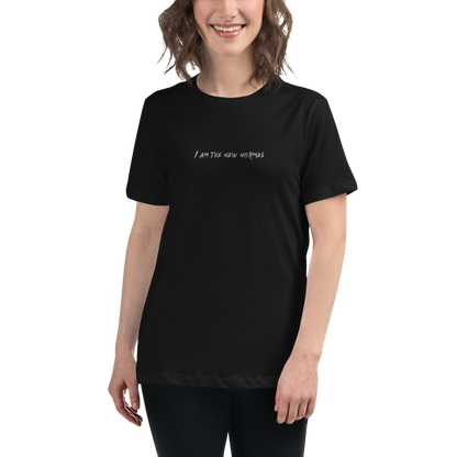 "I am the new normal" printed on a black women's relaxed t-shirt worn by a female