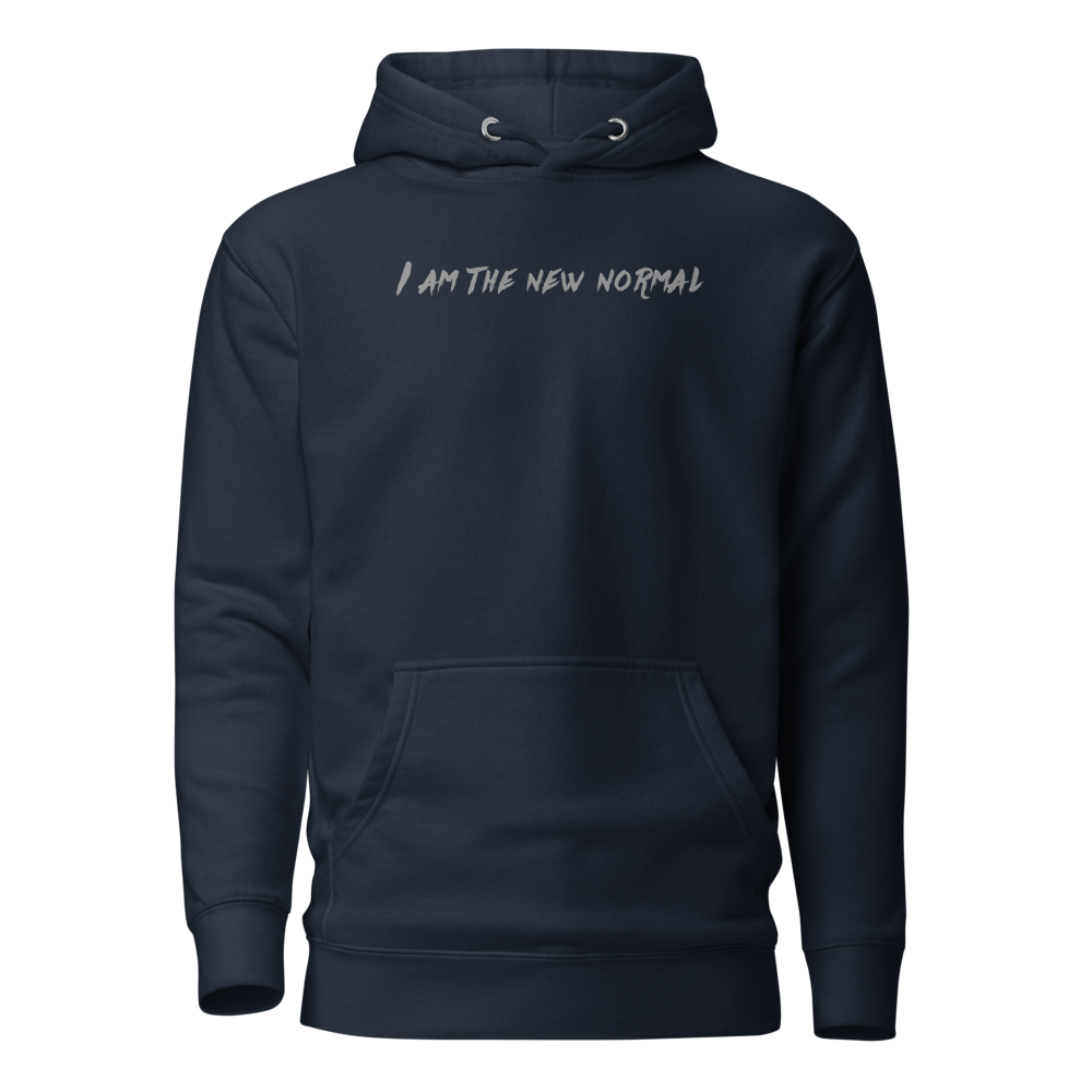 "I am the new normal" printed on a navy blazer on an invisible / simulated body