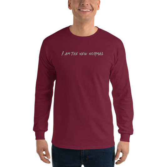 "I am the new normal" printed on a maroon men's long sleeve shirt worn by a male