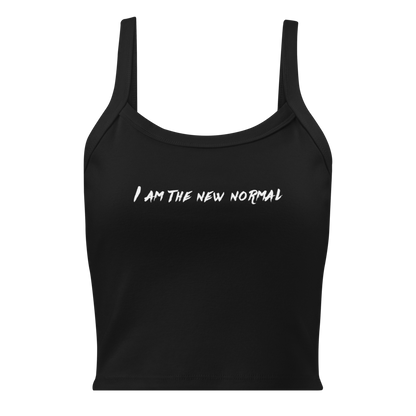 "I am the new normal" printed on a solid black blend women's micro-rib tanktop laying on a flat surface