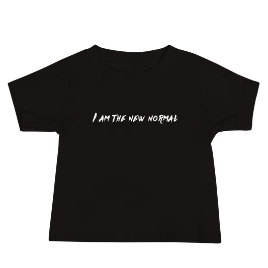 "I am the new normal" printed on a black baby jersey short sleeve tee laying on a flat surface