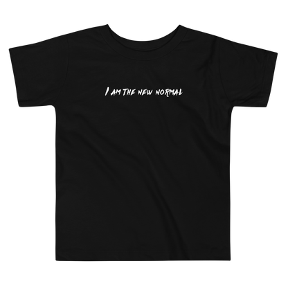 "I am the new normal" printed on a black toddler short sleeve tee laying on a flat surface