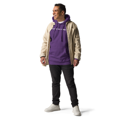 "I am the new normal" printed on a purple unisex hoodie worn by a male with a jacket on top