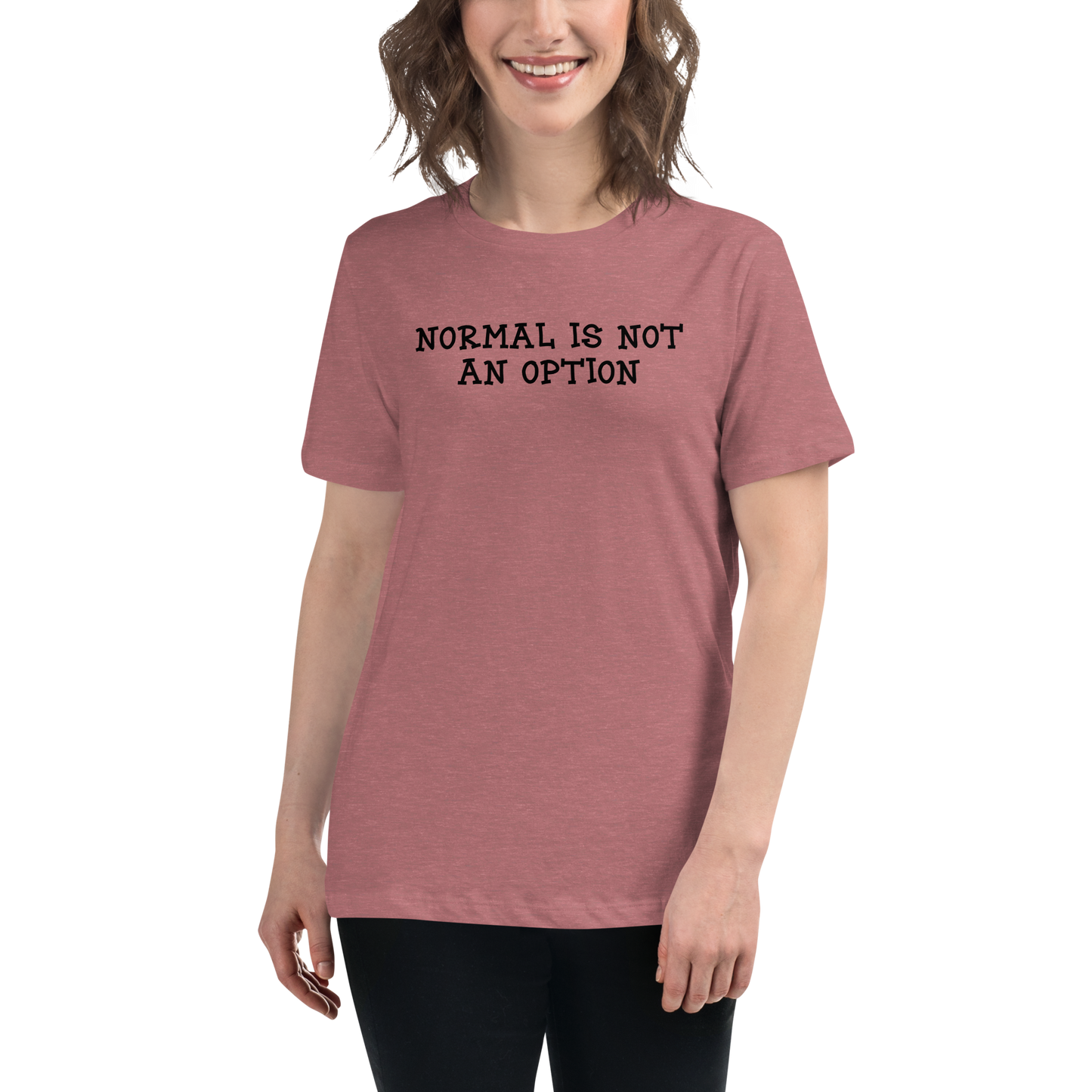 "Normal is not an option" printed on a heather mauve women's relaxed t-shirt worn by a female