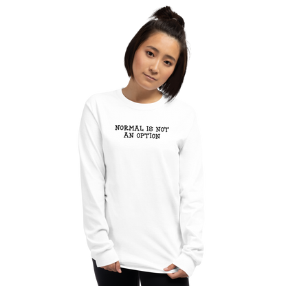 "Normal is not an option" printed on a white men's long sleeve shirt worn by a female