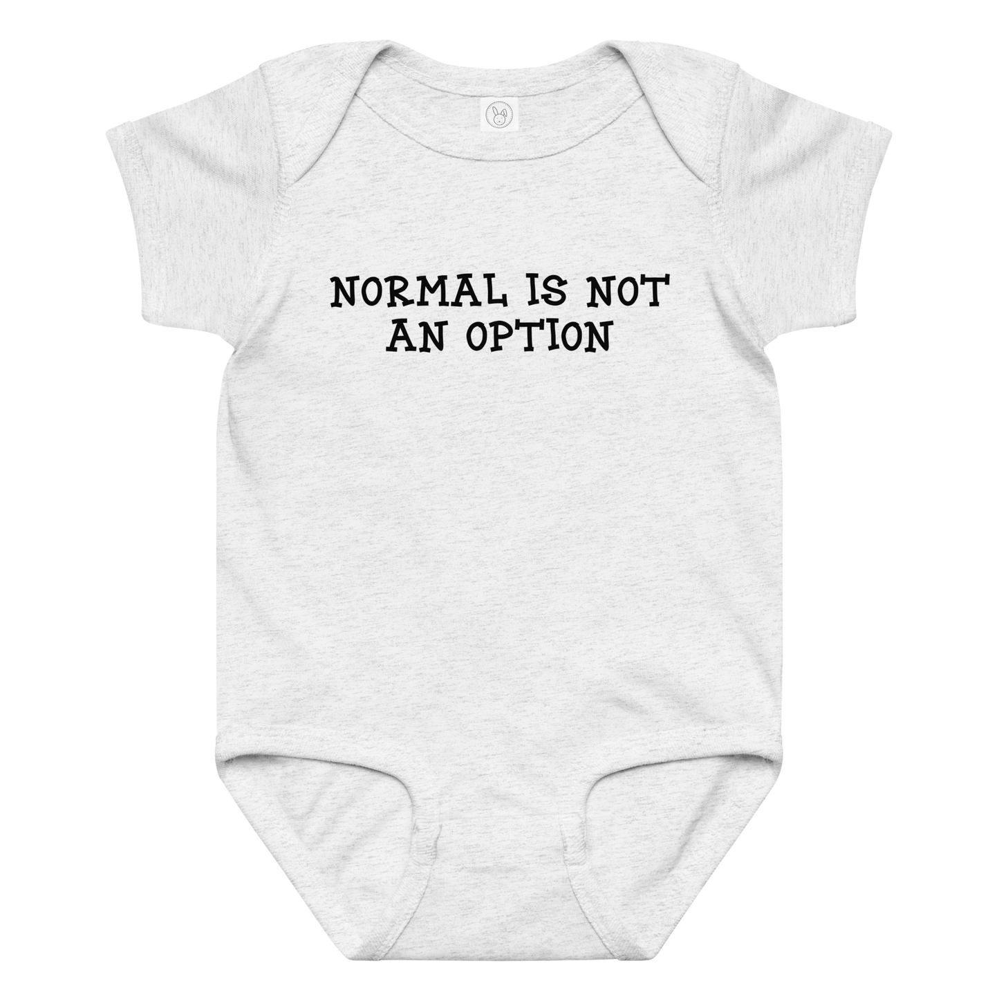 "Normal is not an option" printed on a ash baby jersey bodysuit laying on a flat surface amongst other clothes