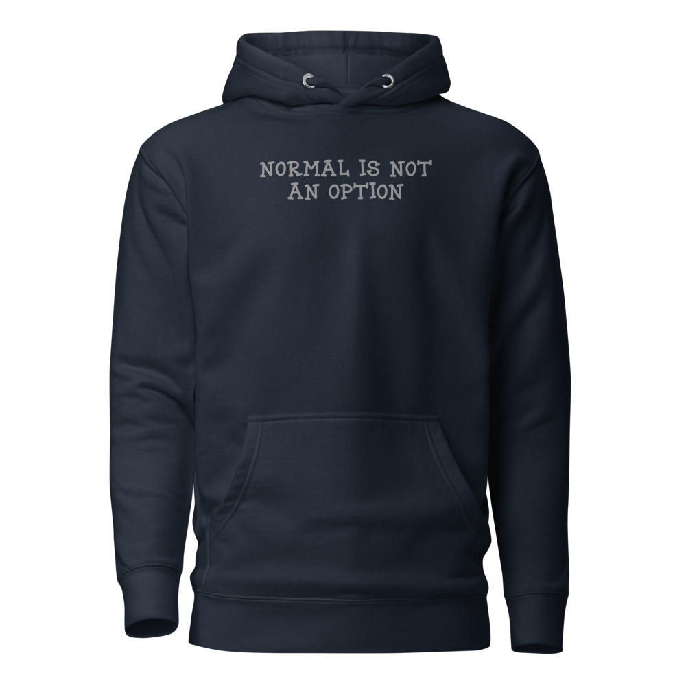 "Normal is not an option" printed on a navy blazer on an invisible / simulated body