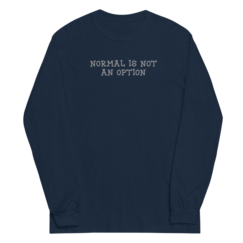 "Normal is not an option" printed on a navy men's long sleeve shirt laying on a flat surface