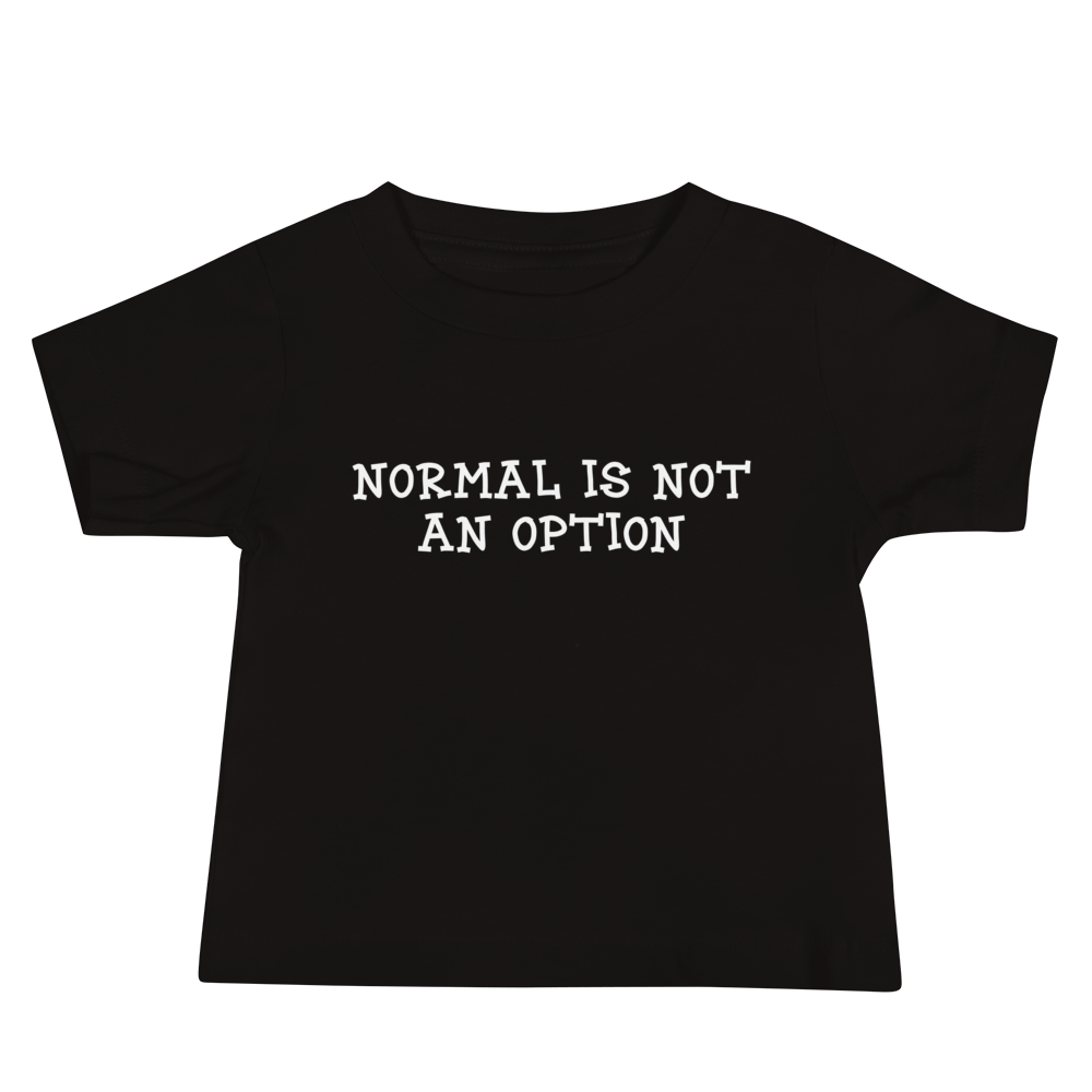 "Normal is not an option" printed on a black baby jersey short sleeve tee laying on a flat surface
