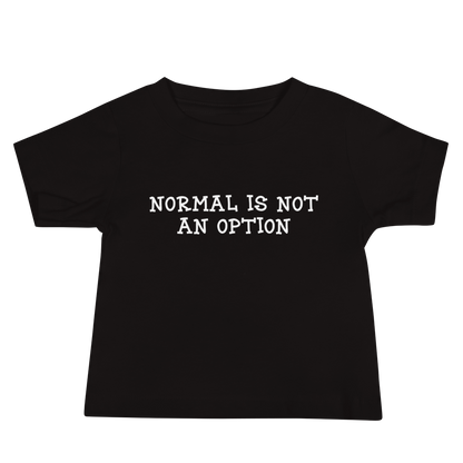 "Normal is not an option" printed on a black baby jersey short sleeve tee laying on a flat surface