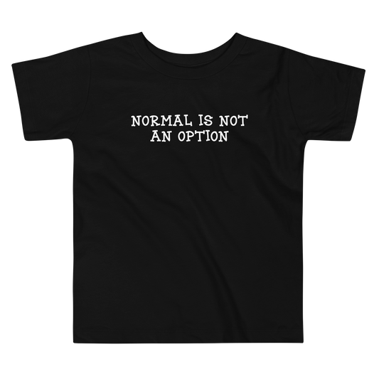 "Normal is not an option" printed on a black toddler short sleeve tee laying on a flat surface