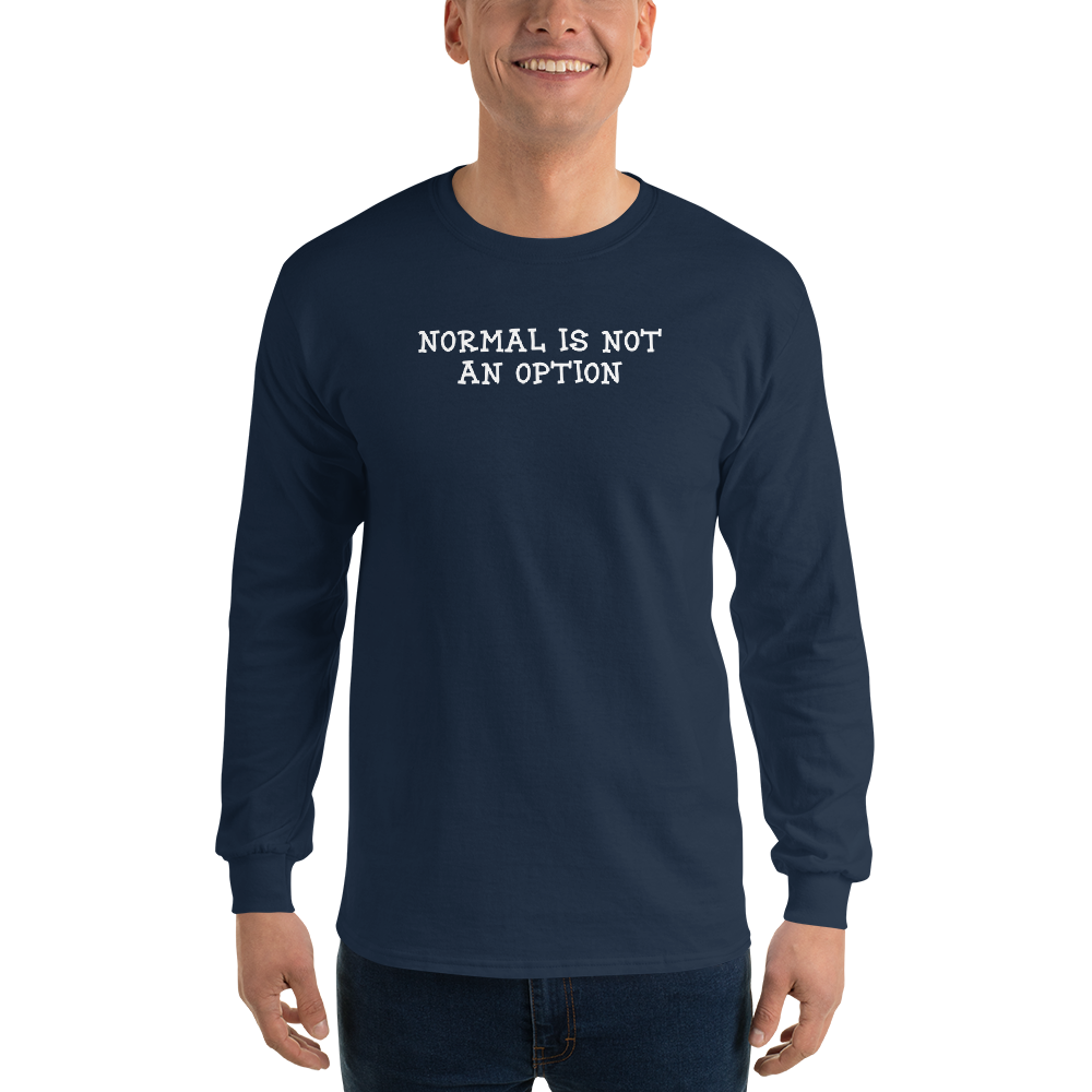 "Normal is not an option" printed on a navy men's long sleeve shirt worn by a male