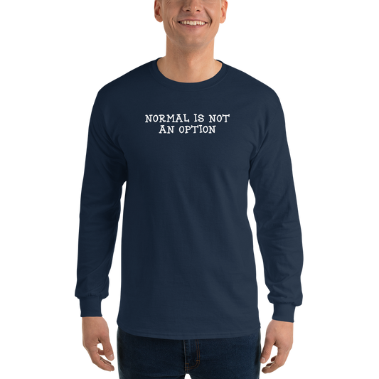"Normal is not an option" printed on a navy men's long sleeve shirt worn by a male